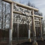 Image of Voices of Remembrance, a work of public art commissioned by TriMet that references the Japanese internment camp that was built during WWII at the site that is now the MAX Yellow Line Expo Center station.