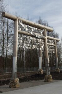 Image of Voices of Remembrance, a work of public art commissioned by TriMet that references the Japanese internment camp that was built during WWII at the site that is now the MAX Yellow Line Expo Center station.