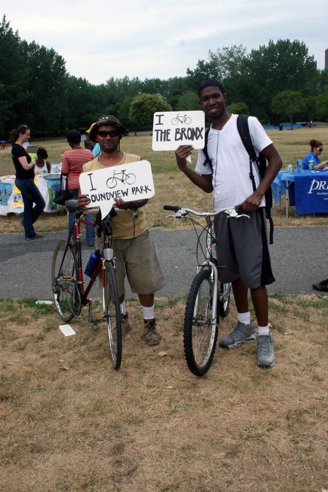 Bronx residents with signs and bikes during boogie down event