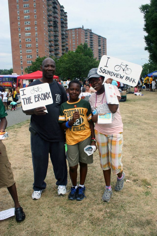 Bronx residents with signs during boogie down event