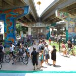 Image of Chinaco Park where you can see the murals painted underneath the highway.
