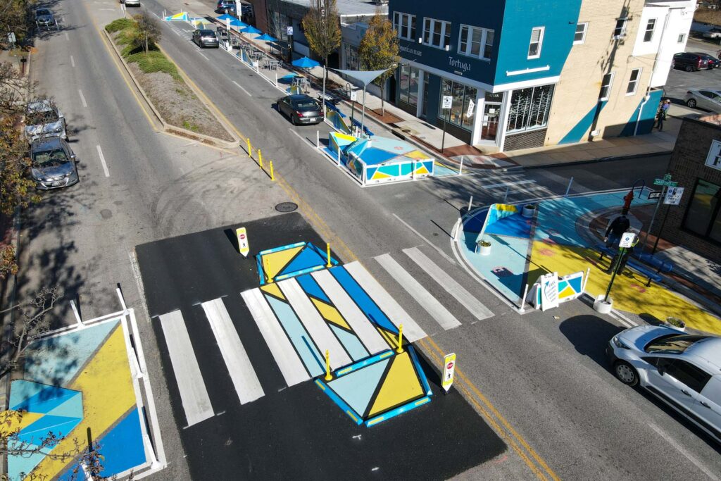 overhead view of a creatively painted crosswalk and bulb-outs and sidewalk extensions